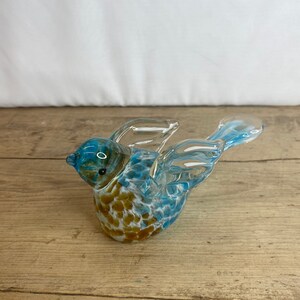 Vintage Unnamed Clear Glass Bird Paperweight with Blue and Brown Spots Inside. In Good Condition