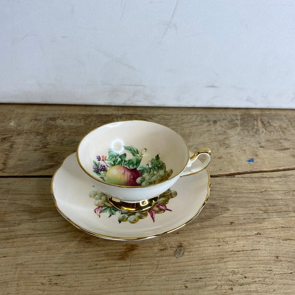 Vintage Regency Footed Tea Cup and Saucer Set Yellow and Floral Pattern Design in Good Condition.