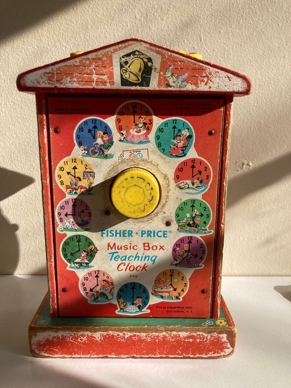 Jouet éducatif Fisher-Price Horloge Musicale Réf 998 Japan - Années 60