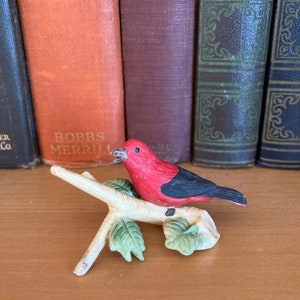 Royal Cornwall bird on a branch, 1982, scarlet tanager