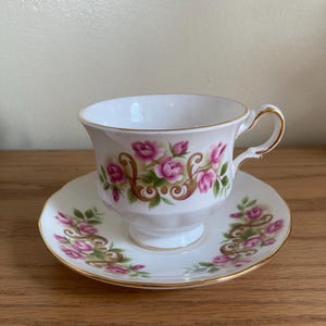 Queen Anne bone china teacup and saucer, made in England, pattern number 8505