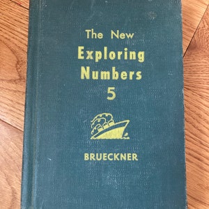 The New Exploring Numbers 5 vintage hardcover math book by Leo J. Brueckner