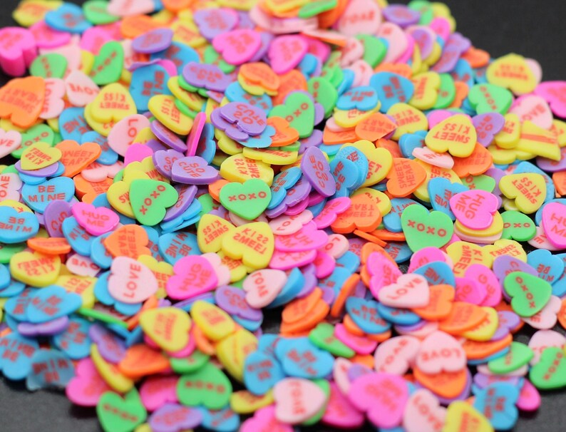 bright conversation hearts polymer clay slices for use in slime, hair gel, nail art, crafting, and diy projects