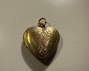 vintage 1960's deadstock brass locket with two hearts design