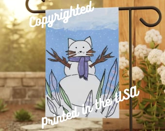 May include: A white cat snowman with purple scarf and brown twig arms on a blue background with white snowflakes. The text "Copyrighted" is at the top of the image and "printed in the USA" is at the bottom.
