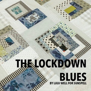 Peut inclure: Une courtepointe composée de différents tissus à motifs dans des tons de bleu, vert, blanc et noir. La courtepointe est disposée selon un motif de carrés dans des carrés, créant un design visuellement intéressant. La courtepointe est intitulée "The Lockdown Blues" par Lulu Well pour Sunspell.