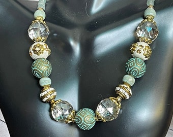 19” necklace in shades of green, white, clear and gold with matching earrings