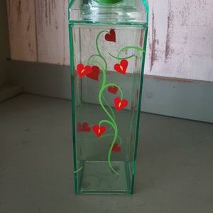Green milk carton water bottle with flowering vine