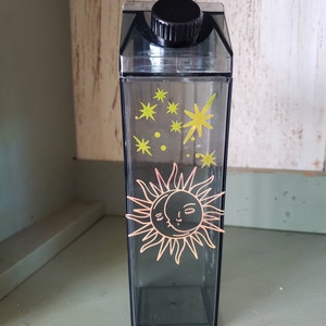 Moon and Sun 17 ounce black milk carton bottle
