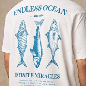 HIMLAND Men's Casual Fish Graphic Print Loose Drop Shoulder Crew Neck Short Sleeve T-Shirt,