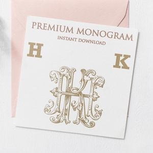 May include: A white card with the text "PREMIUM MONOGRAM INSTANT DOWNLOAD" and the letters "H" and "K" in gold. A gold monogram with the letters "HK" in a decorative font is in the center of the card.