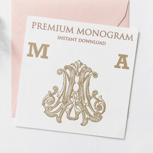 May include: A premium monogram design featuring the letters "M" and "A" in a decorative, ornate font. The letters are intertwined with intricate flourishes and scrolls, creating a sophisticated and elegant design. The monogram is printed in gold on a white background.