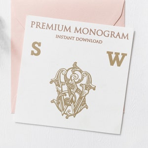 May include: A white card with the text "PREMIUM MONOGRAM INSTANT DOWNLOAD" and the letters "S" and "W" in gold. A gold monogram design with the letters "S" and "W" intertwined is in the center of the card.