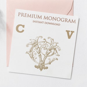 May include: A white card with gold lettering that says "PREMIUM MONOGRAM INSTANT DOWNLOAD" and features a gold monogram of the letters "C" and "V" with ornate flourishes.