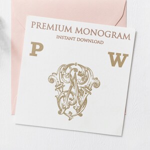 May include: A white card with a gold monogram design featuring the letters "P" and "W". The card also has the text "PREMIUM MONOGRAM" and "INSTANT DOWNLOAD" in gold. The card is placed on a pink envelope.