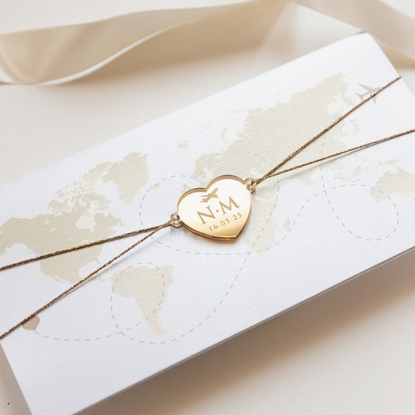 Gold passport wedding invitation as a pocket fold with a gold heart pendant, destination wedding, foreign wedding, luxury, boarding pass