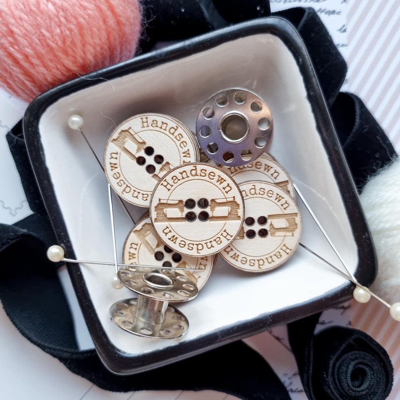 seamstress sewer wooden buttons with engraving and sewing machines for handmade sewing items Handsewn made with love for tailor