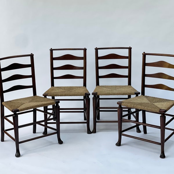 A Set of 4 Ladder Back Chairs