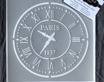 May include: A gray stencil of a clock face with Roman numerals and the words "PARIS" and "1937".