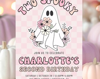 May include: A pink and white invitation with a ghost holding flowers. The text reads "Two Spooky" and "Charlotte's Second Birthday". The invitation includes the date, time, and location of the party, as well as an RSVP request.