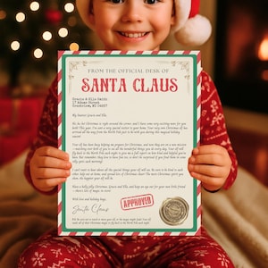 May include: A child holding a Christmas letter from Santa Claus. The letterhead reads "From the Official Desk of Santa Claus" and includes the names and address of the recipients. The letter is decorated with red and green borders and a wax seal.