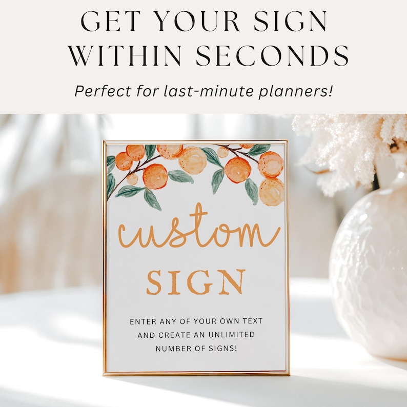 Op de afbeelding: Een gouden bord met een aquarel-illustratie van sinaasappelbloesems en de tekst "custom sign". Het bord bevat ook de tekst "Voer uw eigen tekst in en maak een onbeperkt aantal borden!"