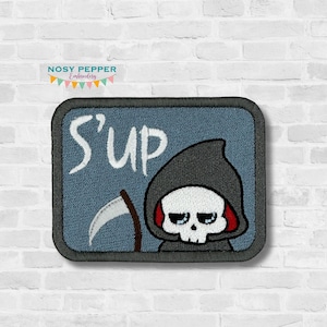 May include: An embroidered iron-on patch with a blue background and the text "S'UP" in white. A cartoon grim reaper with a scythe is on the right side of the patch.