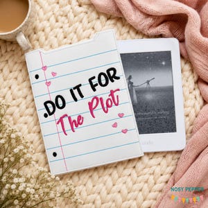 May include: A white e-reader case featuring a notebook paper design with blue horizontal lines, a pink vertical margin line, and small pink hearts. The text "DO IT FOR The Plot" is printed in black and pink. The case is shown next to an e-reader.