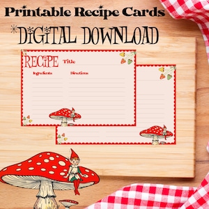 May include: Printable recipe cards with a whimsical mushroom and elf design. The cards have a red and white border and are perfect for organizing your favorite recipes.