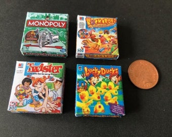 4 Miniature Toy/games boxes.  Monopoly, Buckaroo, Twister, Lucky ducks 1:12