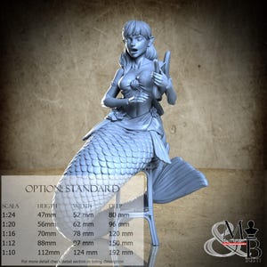 May include: A detailed sculpture of a mermaid with flowing hair, holding a harp. The mermaid has a scaled tail and is seated on a stool. The image includes a chart with measurements in millimeters for different scales, including a height of 47mm, width of 52mm, and depth of 80mm at 1:24 scale.