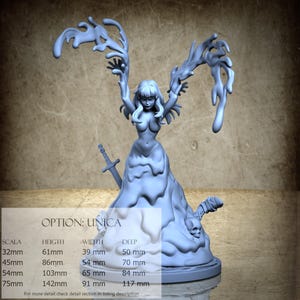 May include: A light blue Unica figurine with a female form, flowing hair, and outstretched arms. A sword is positioned near the figure's waist. The base includes a skull and other details. The text "OPTION: UNICA" is visible. Measurements are provided in millimeters.