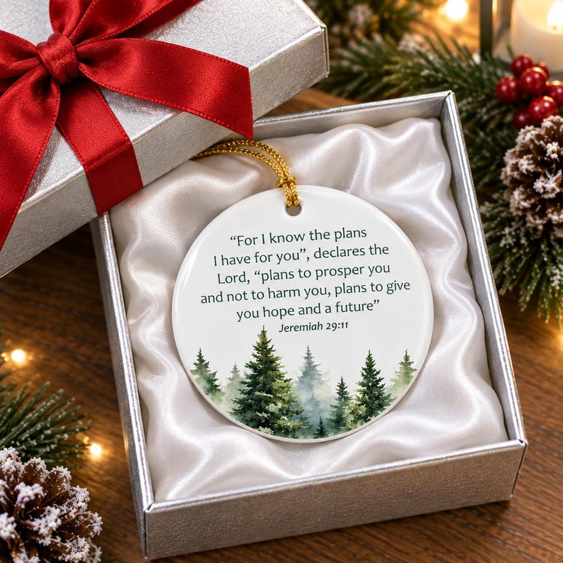 A beautiful glossy finish ceramic Christmas ornament with pine trees and a bible verse from Jeremiah 29:11 - For I know the plans I have for you.  Perfect graduation gift for a son or daughter, Christmas stocking stuffers, Christmas gift for husband, coworker or friend.