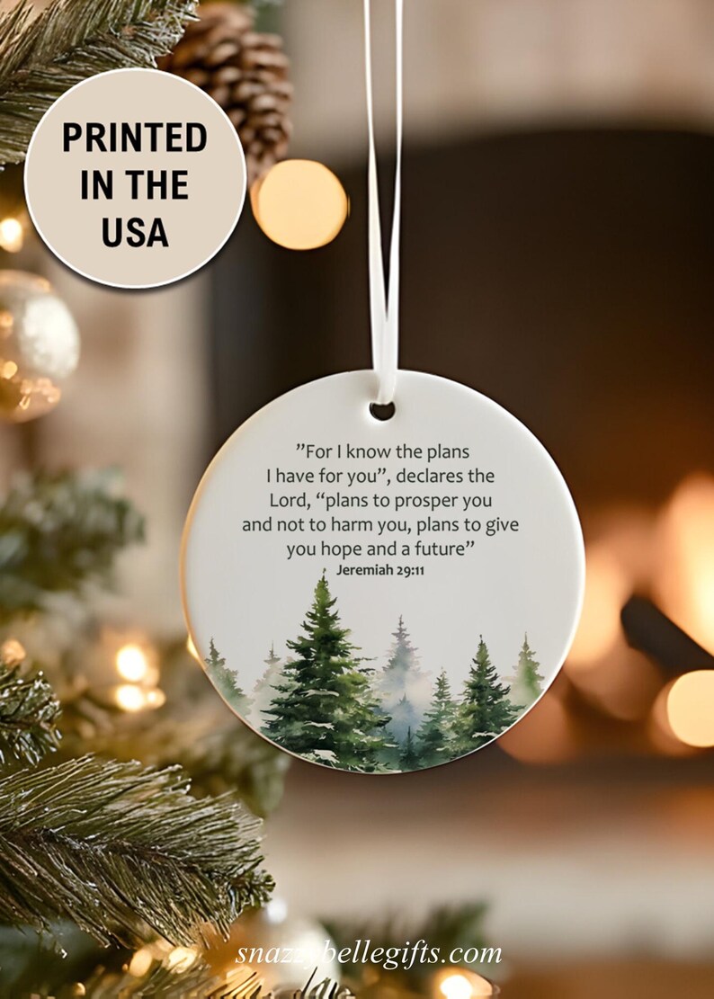 An aesthetic Christian Christmas ornament with bible verse from Jeremiah 29:11 "For I know the plans I have for you", featuring a watercolor pine trees design . Personalize it with name and date and it becomes a unique religious keepsake gift for a men and women. 

Our meticulously handprinted keepsake ornaments are crafted from premium quality ceramic using high quality ink. Will never fade. Scratch resistant. 100% satisfaction guarantee.