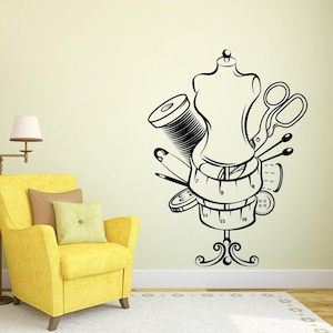 May include: Black and white illustration of a sewing mannequin with a spool of thread, scissors, needles, and a measuring tape. The mannequin is standing on a base with the numbers 7 through 16 on the tape measure.