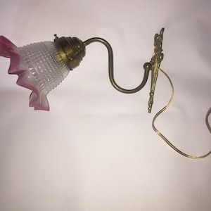 Brass wall sconce