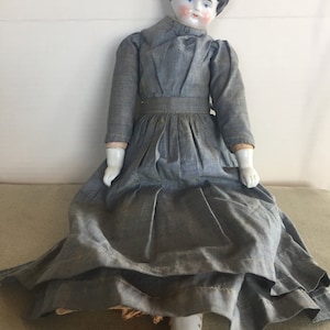 Antique doll with ceramic head