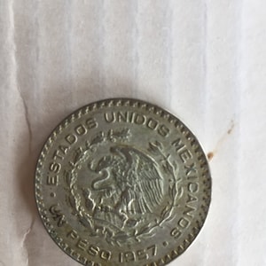 Mexican silver 1 peso coin from 1957