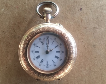 Ladies gold pocket watch