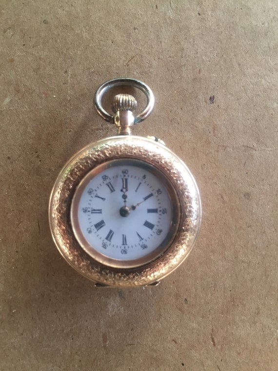 Ladies gold pocket watch