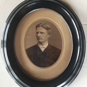 Antique photo with oval frame