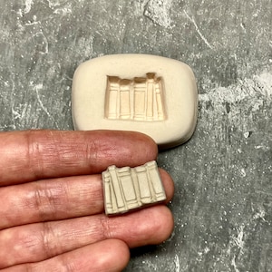 Rad av böcker kvistform