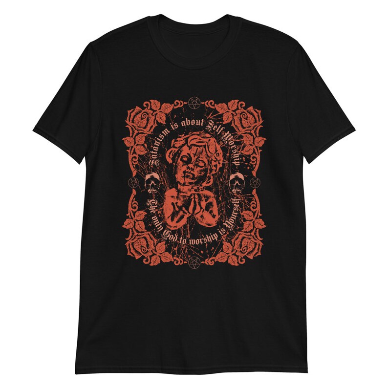 May include: Black t-shirt with a red graphic design featuring a stylized image of a person with the text "Satanism is about Self Worship. The only God to worship is yourself."