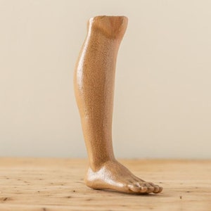Wooden bare male legs image 1