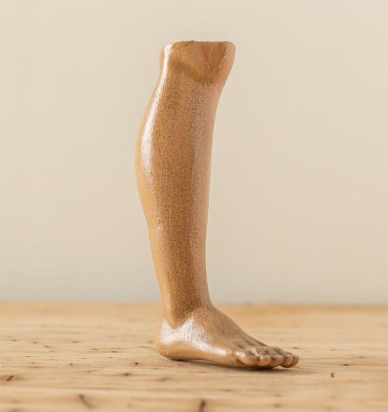 Wooden bare male legs image 1