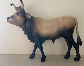 Wood carved bull
