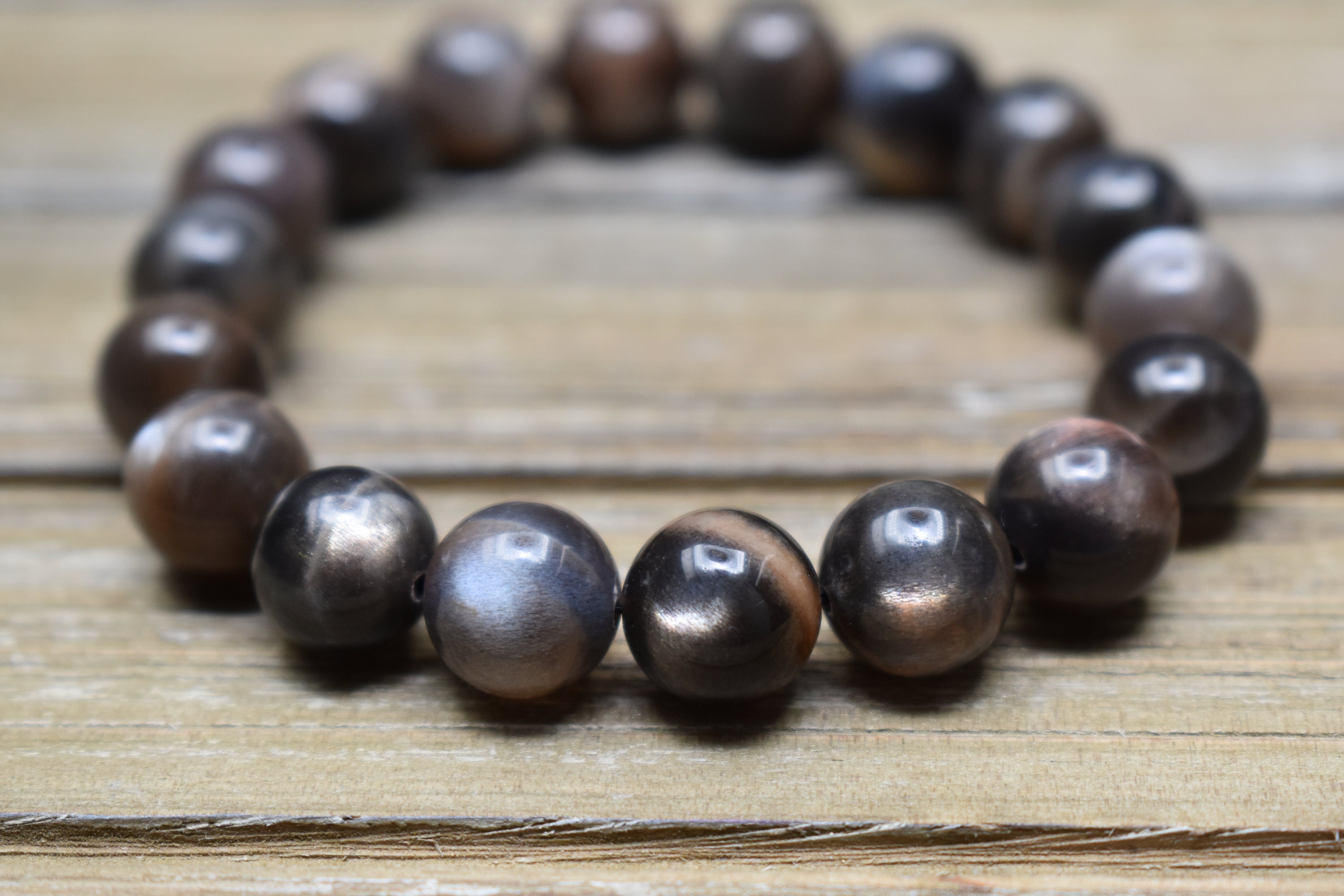 High Grade Black Sunstone skeletal Sunstone Stretch Bracelet 10.5