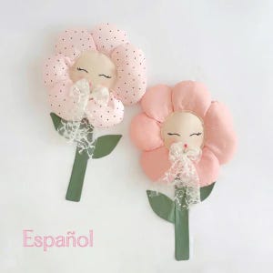 May include: A white ceramic mug with a black handle and the text "But First, Coffee" in a bold, black font. The mug is set against a plain white background.