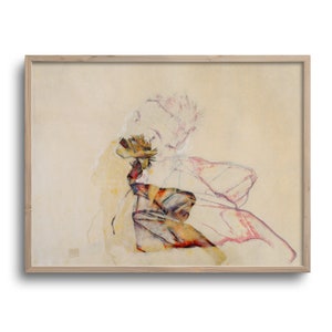 May include: A framed abstract watercolor painting in shades of pink, yellow, and brown. The painting depicts a figure in a reclining pose with a flowing, abstract design.