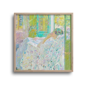 May include: A framed print of an impressionist painting. The artwork depicts a person reclining in a chair, dressed in white, with a floral pattern. The background features a window with green and blue hues, and a wooden frame.
